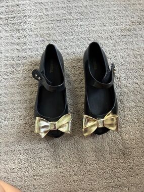 Mini Melissa Black Mary Janes with Gold Bows